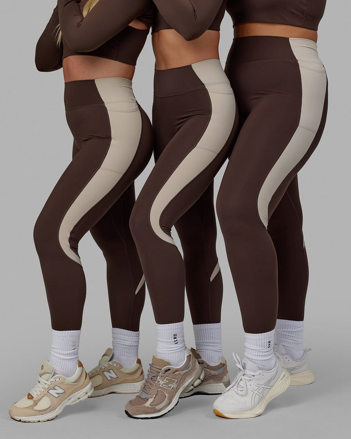 Woman wearing Evolve Full Length Tights - Dark Chocolate