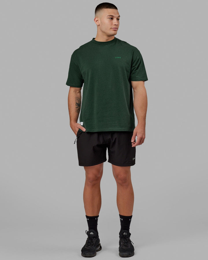  Man wearing Unisex VS2 FLXCotton Tee Oversize - Vital Green-Teal
