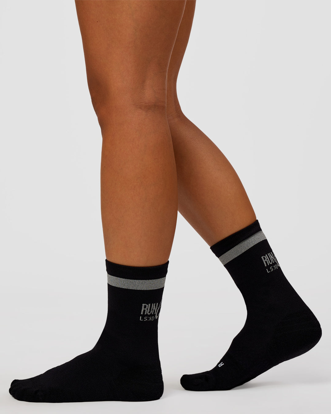 Woman wearing Run Club Fast Performance Socks 2.0 - Black-Reflective