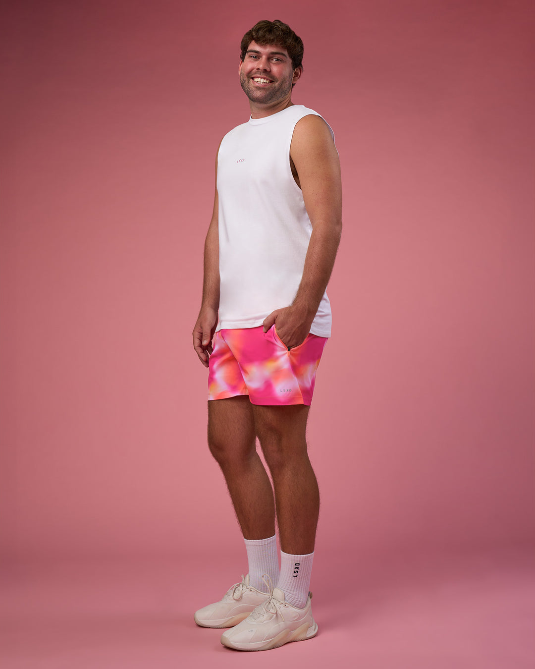 Man wearing BCAM FLXCotton Muscle Tank - White-Ultra Pink | Model:Fletcher | Size:XL