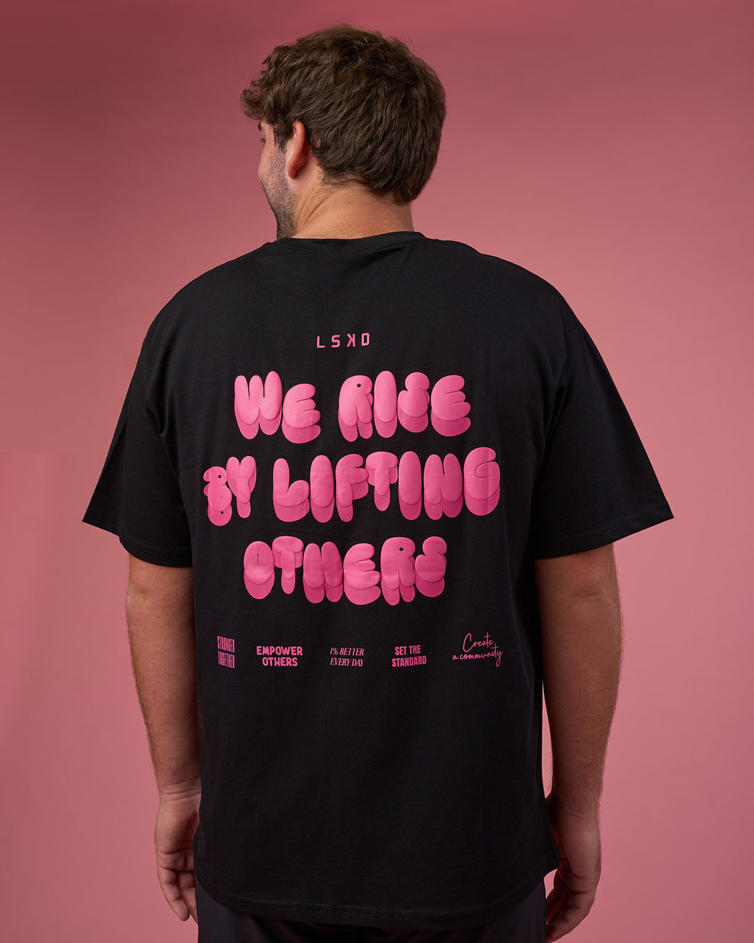 Man wearing BCAM FLXCotton Oversized Tee - Black-Ultra Pink | Model:Fletcher | Size:XL
