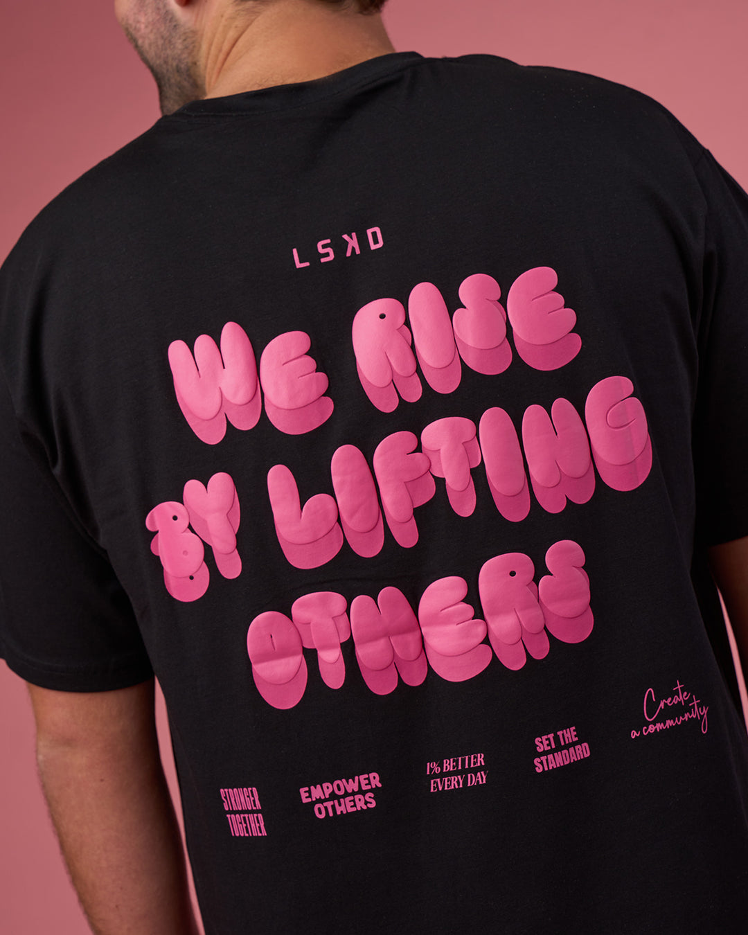 Man wearing BCAM FLXCotton Oversized Tee - Black-Ultra Pink | Model:Fletcher | Size:XL