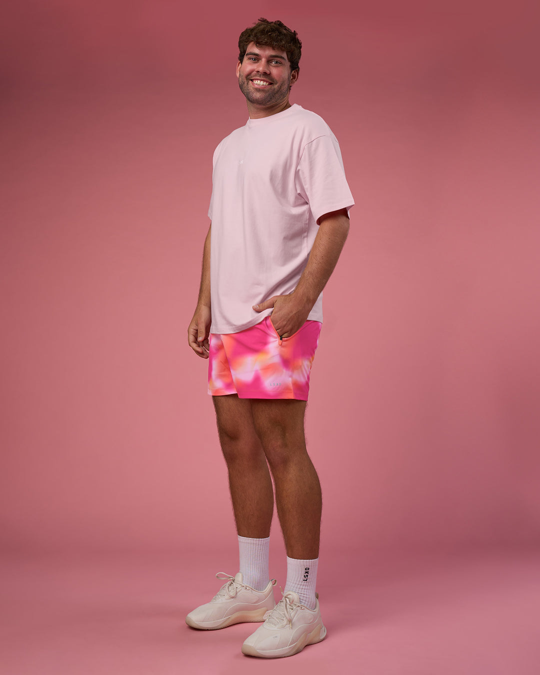 Man wearing BCAM FLXCotton Oversized Tee - Marshmallow-White | Model:Fletcher | Size:XL