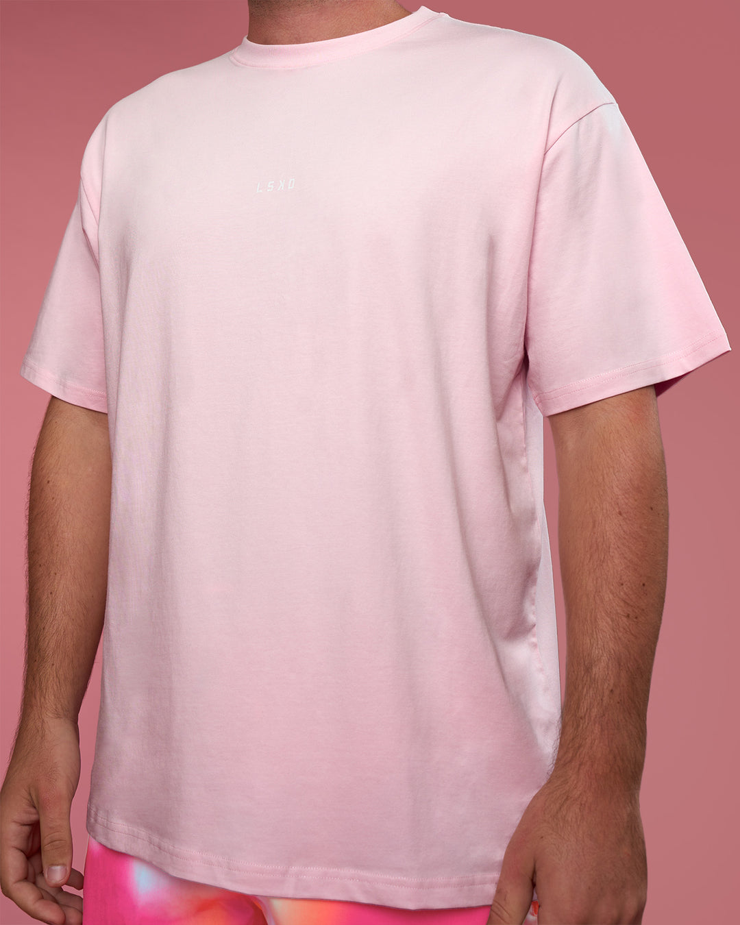 Man wearing BCAM FLXCotton Oversized Tee - Marshmallow-White | Model:Fletcher | Size:XL