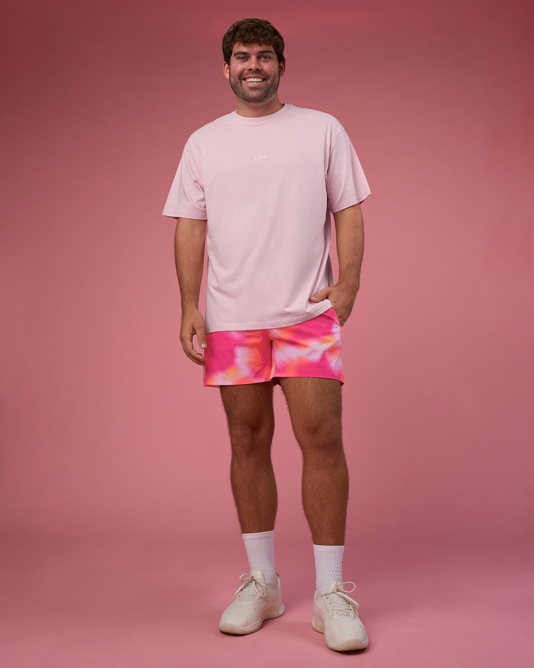 Man wearing BCAM FLXCotton Oversized Tee - Marshmallow-White | Model:Fletcher | Size:XL