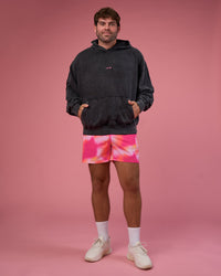 Man wearing BCAM Washed Unisex Oversized Hoodie - Black Washed-Pink | Model:Fletcher | Size:XL