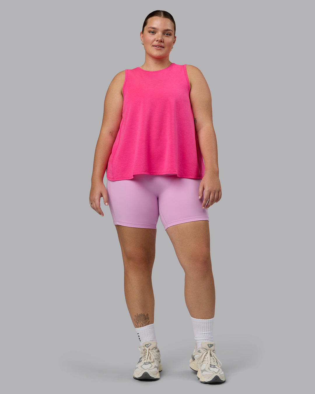 Woman wearing Breeze Training Tank - Ultra Pink - view 4