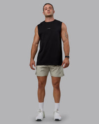 Man wearing Challenger 6" Lined Performance Shorts - Sustained Grey