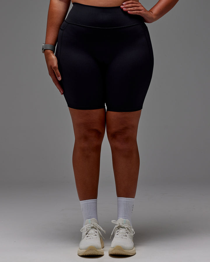 Woman wearing Fusion Bike Short With Pockets in Black | Model:Aimee | Size:XL
