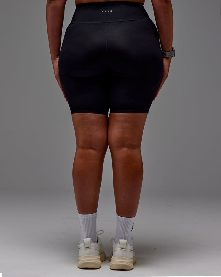 Woman wearing Fusion Bike Short With Pockets in Black | Model:Aimee | Size:XL
