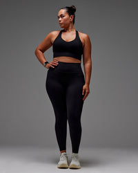 Woman wearing Fusion Ultra High-Rise Full Length Legging Pockets - Black | Model:Aimee | Size:XL