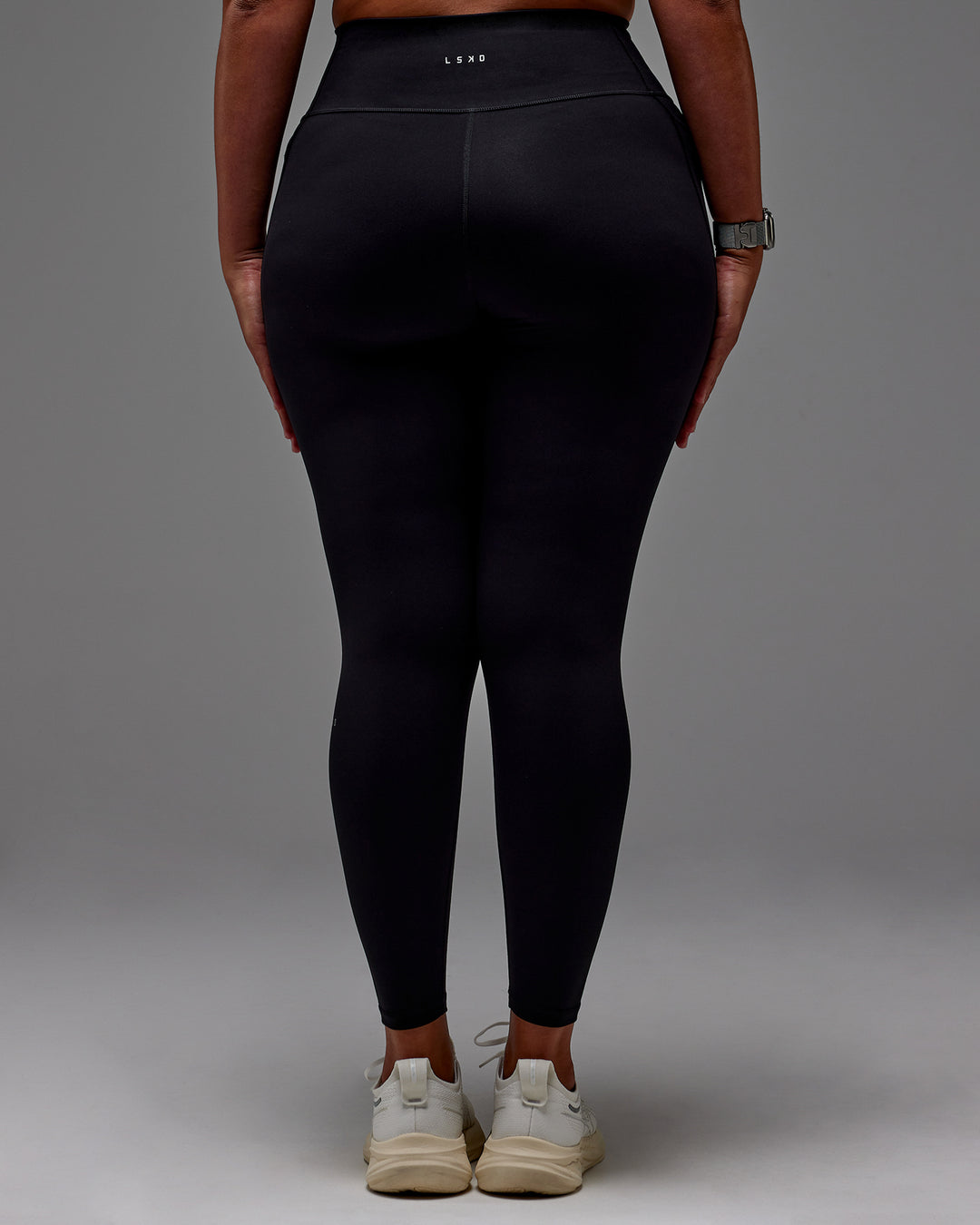 Woman wearing Fusion Ultra High-Rise Full Length Legging Pockets - Black | Model:Aimee | Size:XL