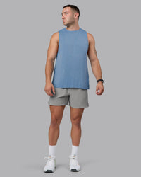 Man wearing Lift 6" Lined Performance Shorts - Circular Grey
