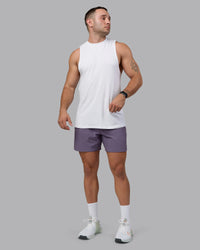 Man wearing Lift 6" Performance Shorts - Purple Sage