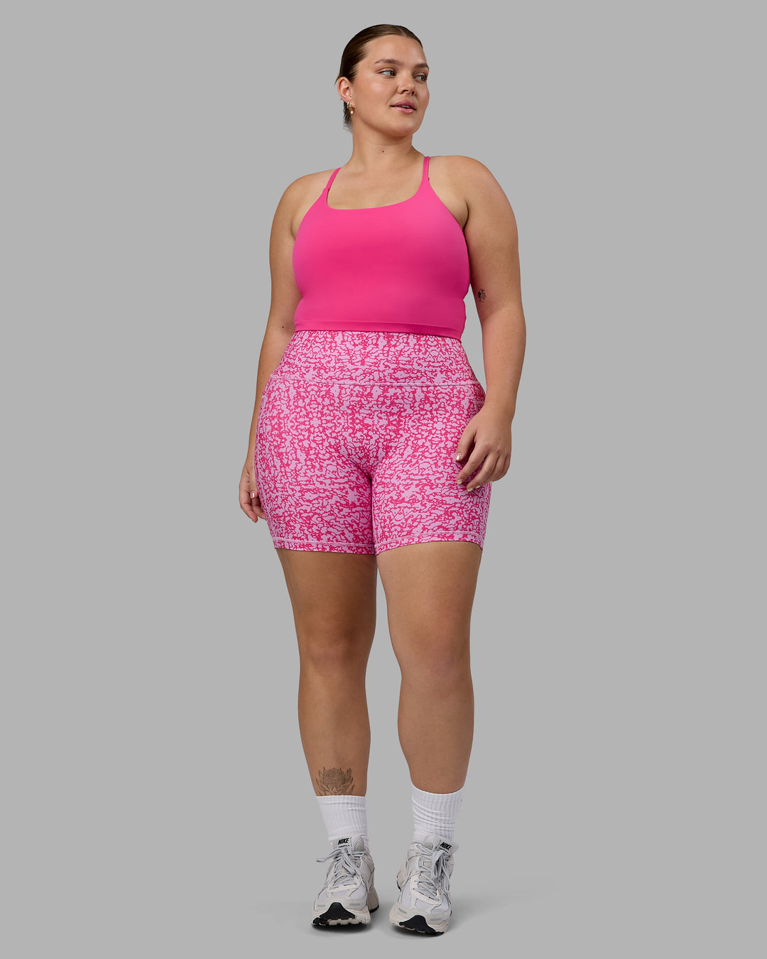 Woman wearing Twist Shelf Bra Tank - Ultra Pink