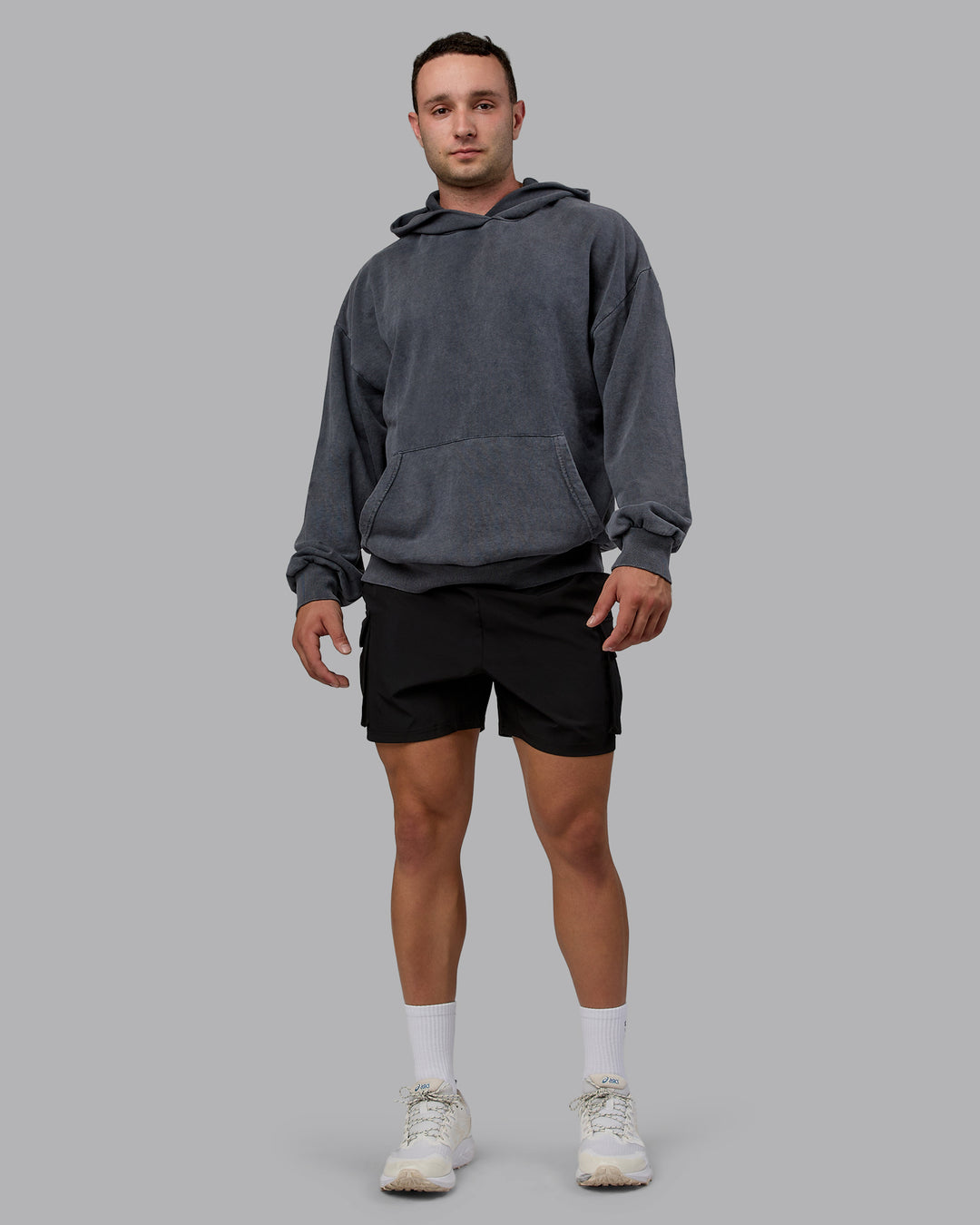 Man wearing Unisex Washed Set the Standard Hoodie Oversize - Black-Greyish Purple