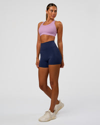 Woman wearing Stability High Support Sports Bra - Light Violet | Model:Charli | Size:XS (A-C Cup)