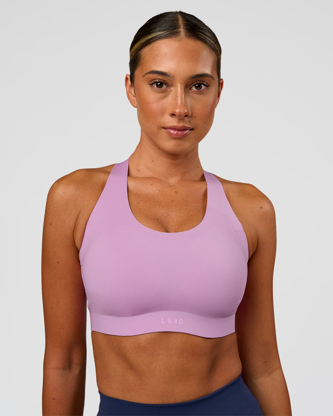 Woman wearing Stability High Support Sports Bra - Light Violet | Model:Charli | Size:XS (A-C Cup)