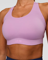 Woman wearing Stability High Support Sports Bra - Light Violet | Model:Charli | Size:XS (A-C Cup)