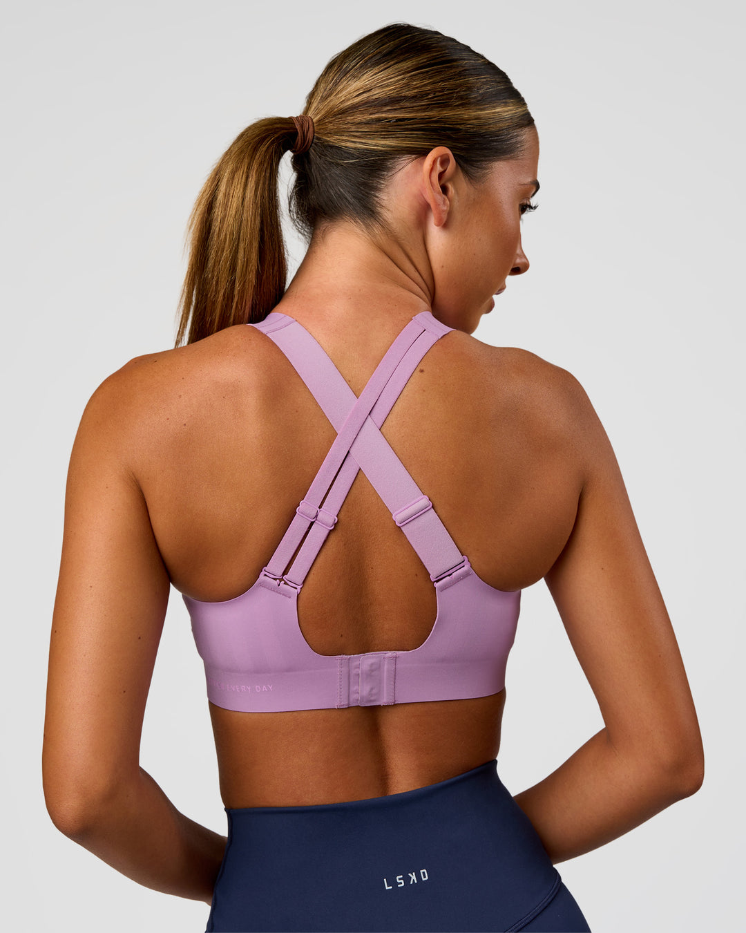 Woman wearing Stability High Support Sports Bra - Light Violet | Model:Charli | Size:XS (A-C Cup)