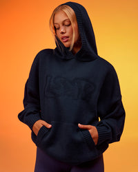 Woman wearing All Day Active Knitted Hoodie - Future Navy | Model:Hailey | Size:XS