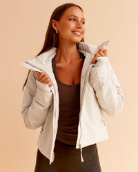 Woman wearing Auxiliary 2.0 Jacket - Shale Beige | Model:Brylee | Size:XS
