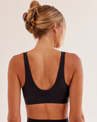Woman wearing Bend & FLX Plunge Sports Bra - Black | Model:Georgia | Size:XS
