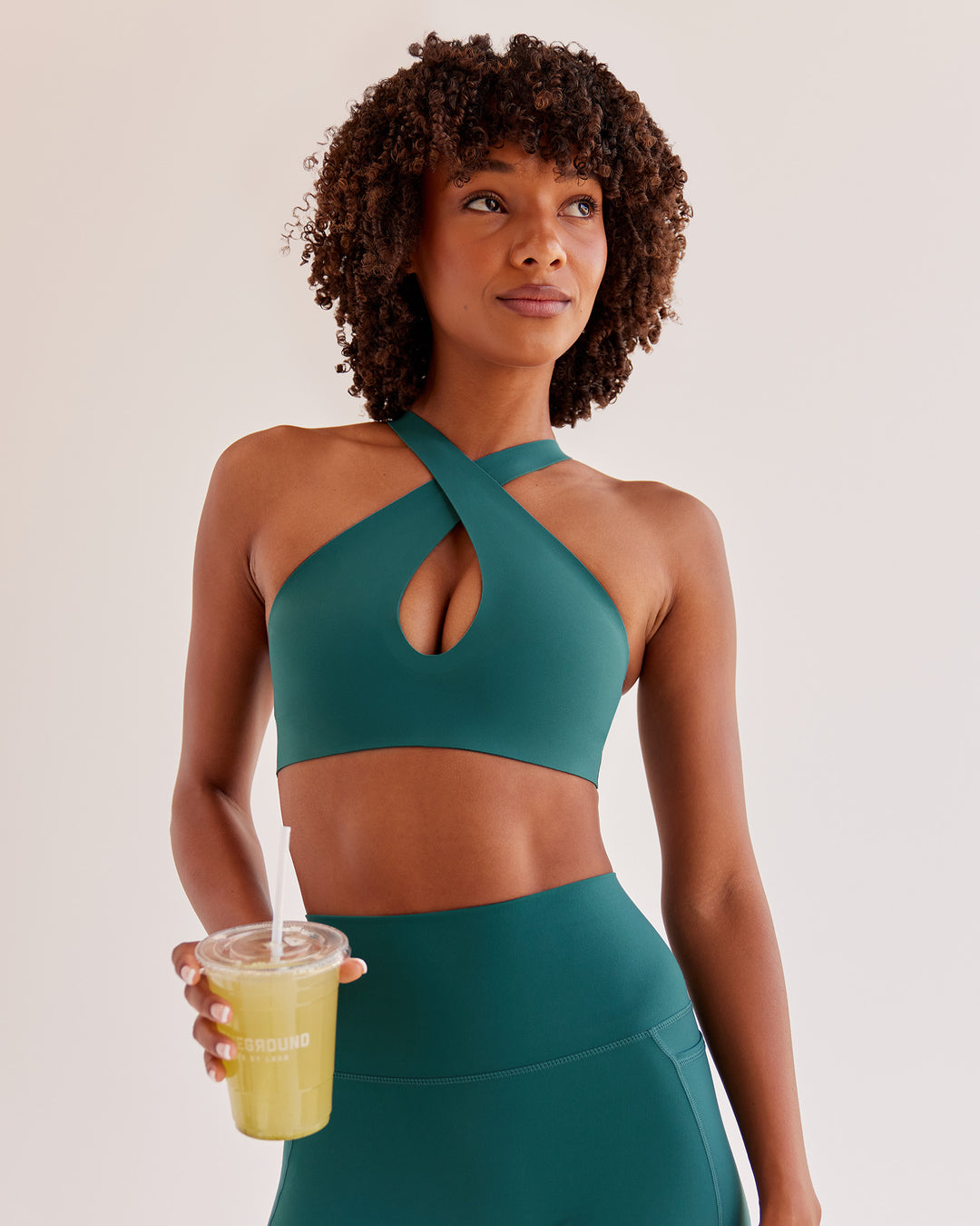 Woman wearing Bend &amp; FLX Plunge Sports Bra - Transformative Teal | Model:Tomi | Size:XS