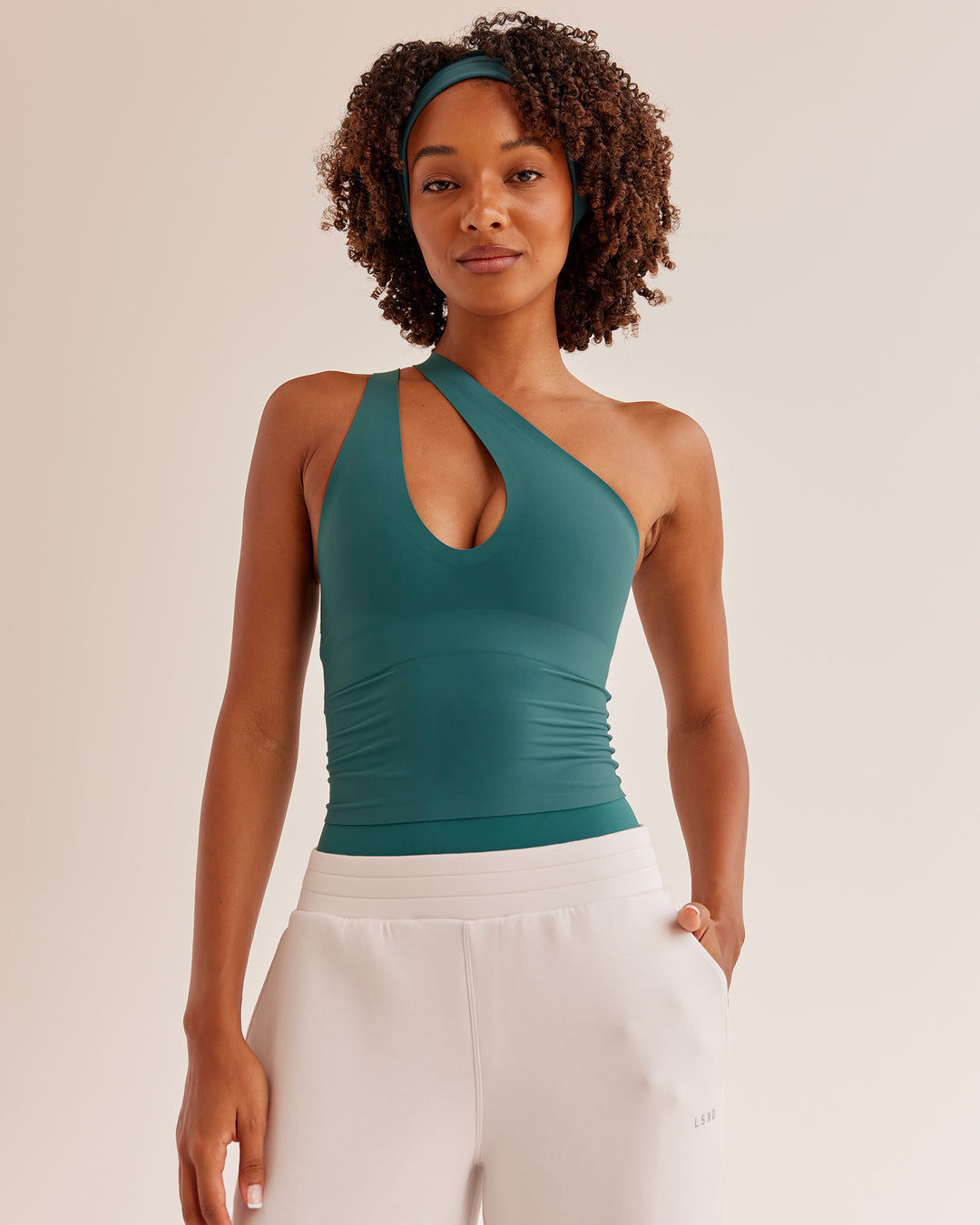 Woman wearing Bend &amp; FLX Plunge Tank - Transformative Teal | Model:Tomi | Size:XS