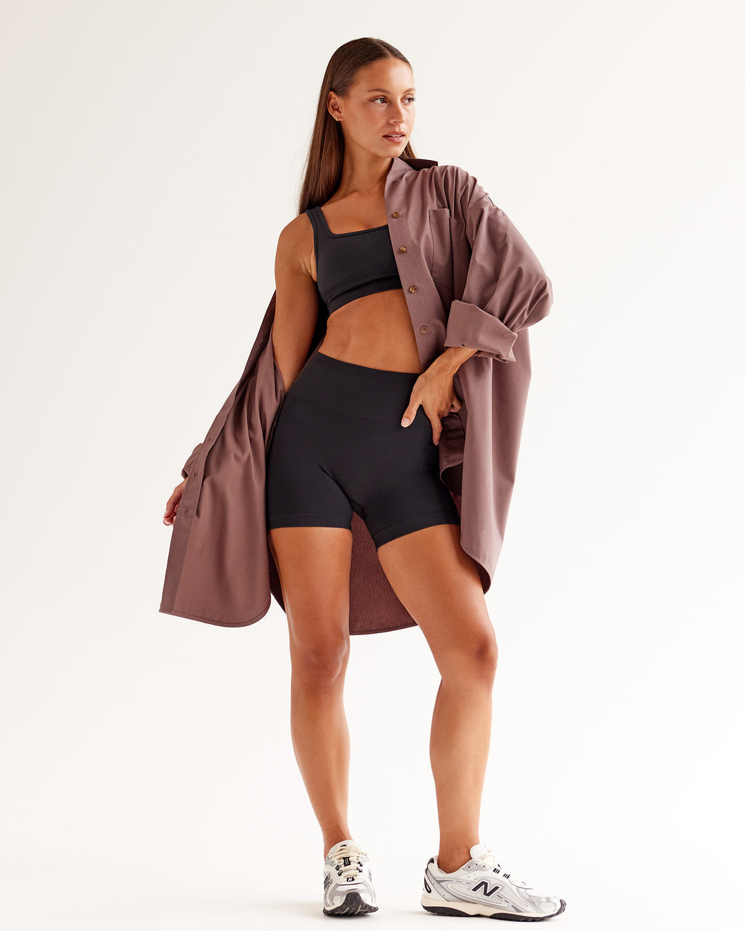Woman wearing Ember Seamless Sports Bra - Black | Model:Brylee | Size:XS