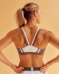 Woman wearing Force Sports Bra - Cocoa Powder-Off White | Model:Maja | Size:XS