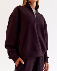 Woman wearing Go-To Oversized Quarter Zip Sweater - Midnight Plum | Model:Jaimee | Size:XS