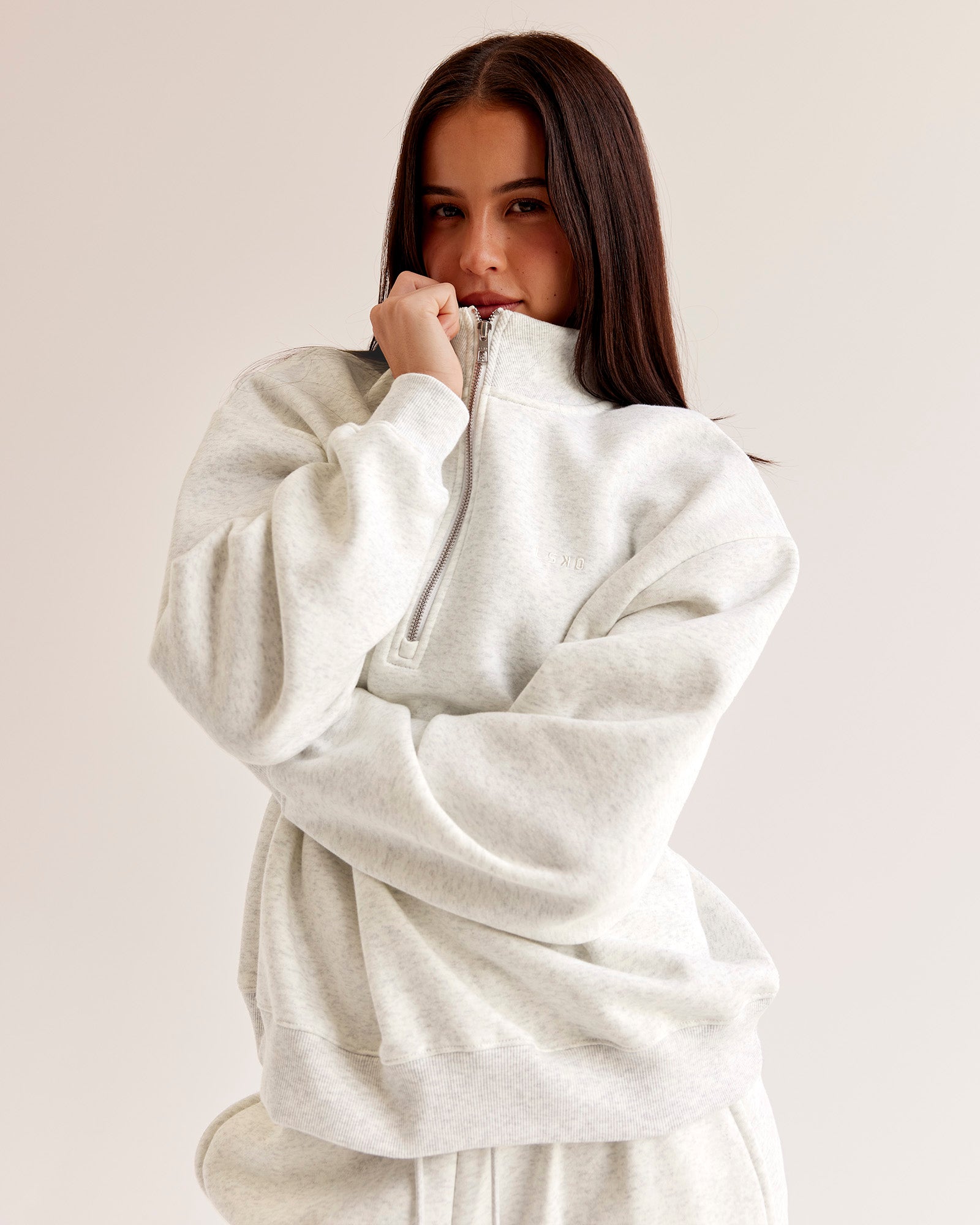 Woman wearing Go-To Oversized Quarter Zip Sweater - Silver Marl | Model:Eliza | Size:XS