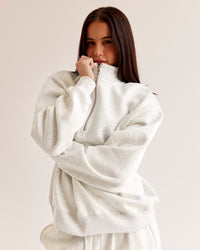 Woman wearing Go-To Oversized Quarter Zip Sweater - Silver Marl | Model:Eliza | Size:XS