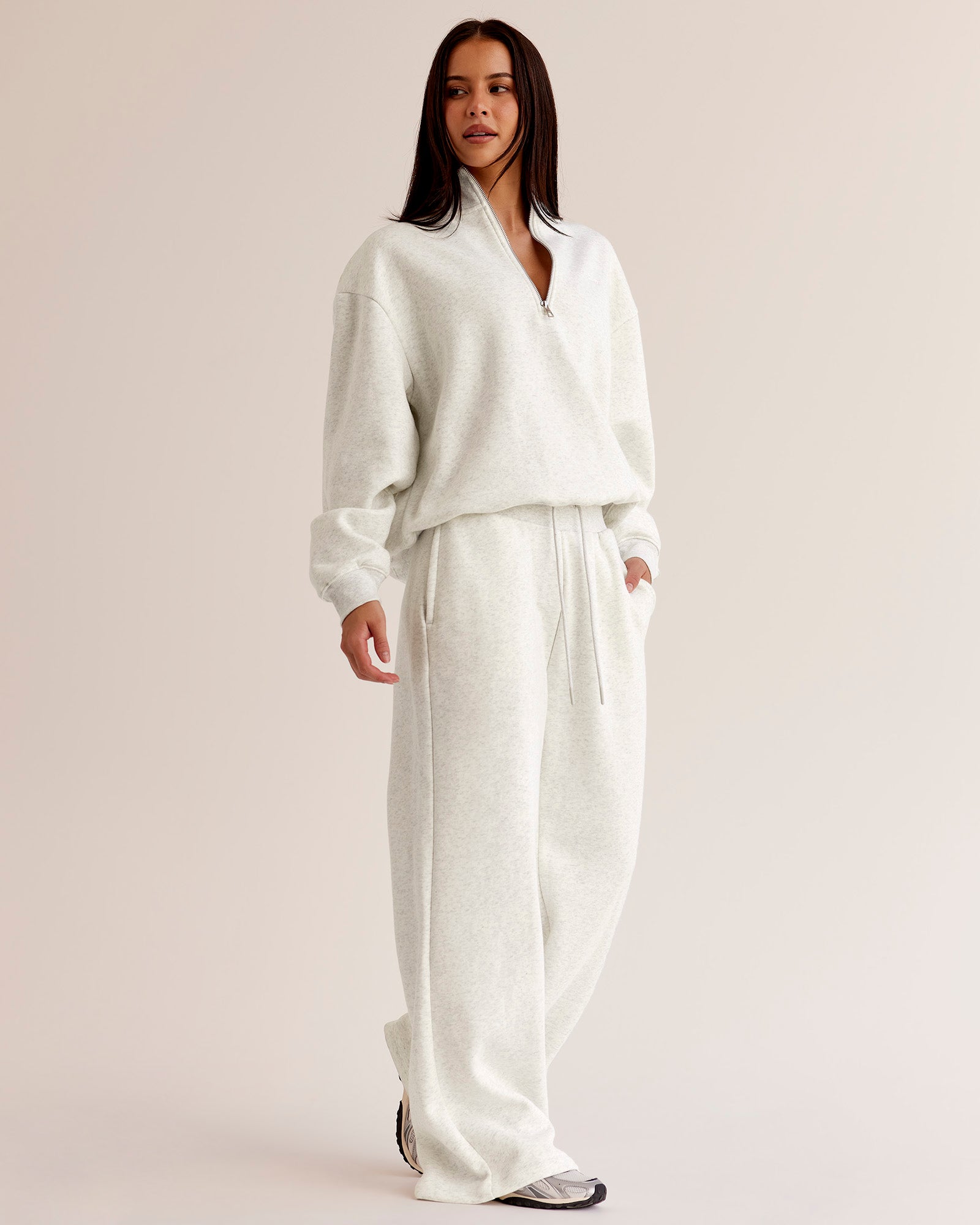 Woman wearing Go-To Oversized Quarter Zip Sweater - Silver Marl | Model:Eliza | Size:XS