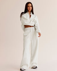 Woman wearing Go-To Oversized Quarter Zip Sweater - Silver Marl | Model:Eliza | Size:XS