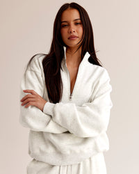 Woman wearing Go-To Oversized Quarter Zip Sweater - Silver Marl | Model:Eliza | Size:XS