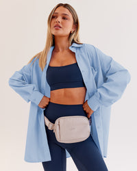 Woman wearing Go-To Oversized Shirt - Poplin Blue | Model:Dana | Size:XS