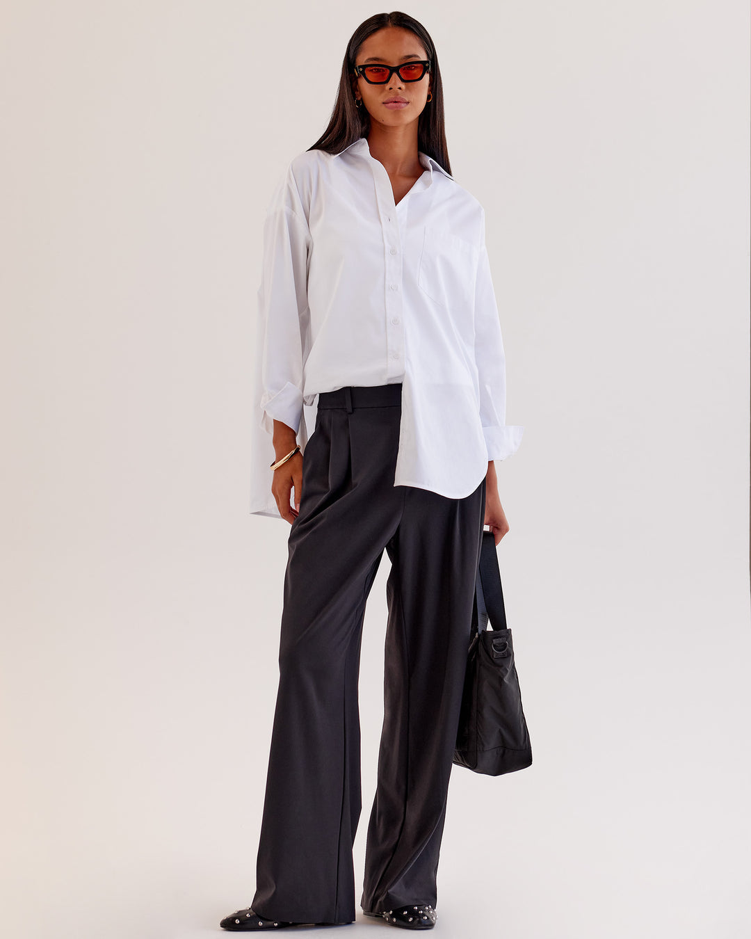 Woman wearing Go-To Oversized Shirt - White | Model:Tali | Size:XS