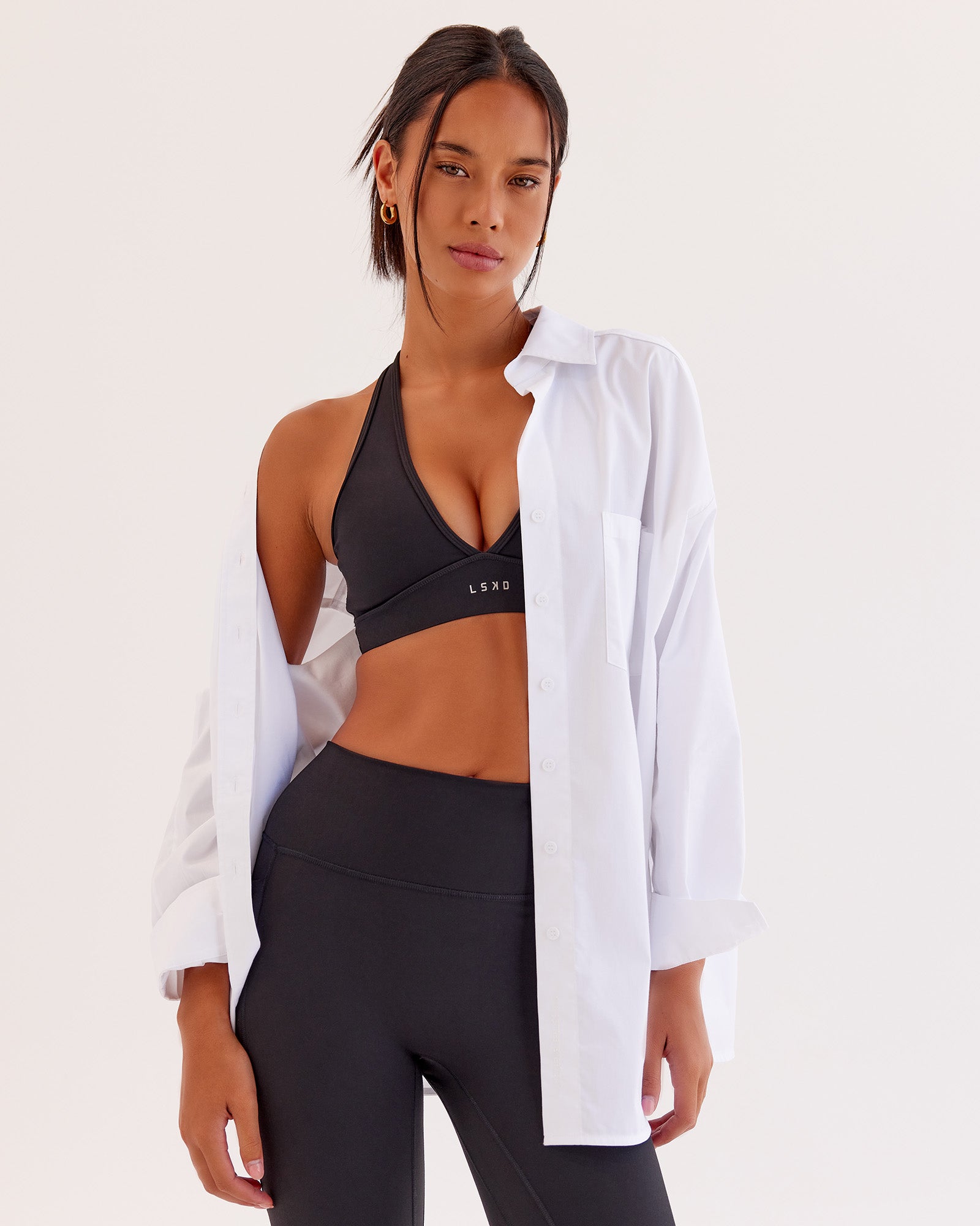 Woman wearing Go-To Oversized Shirt - White | Model:Tali | Size:XS