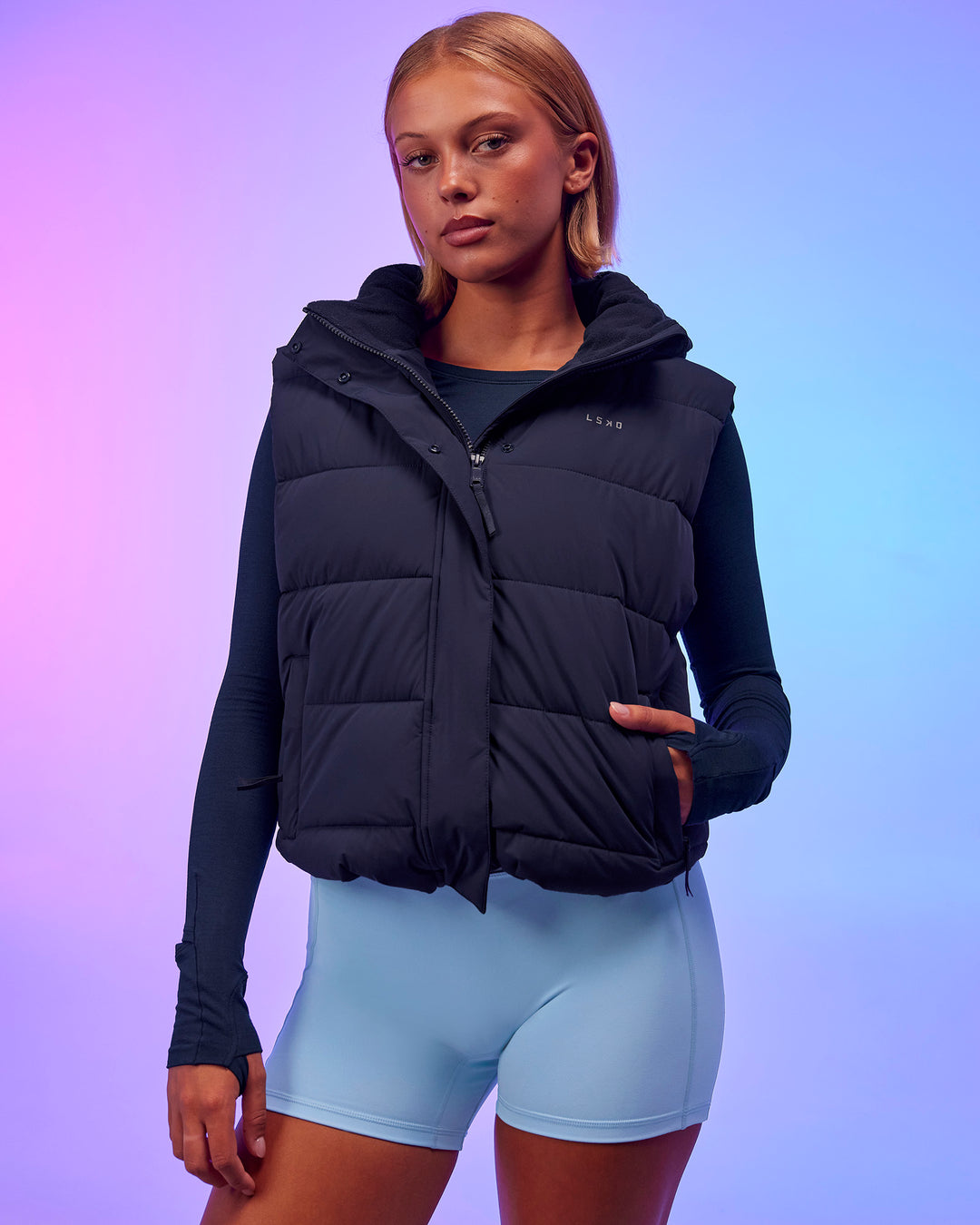 Woman wearing Go-To Puffer Vest - Future Navy | Model:Hailey | Size:XS