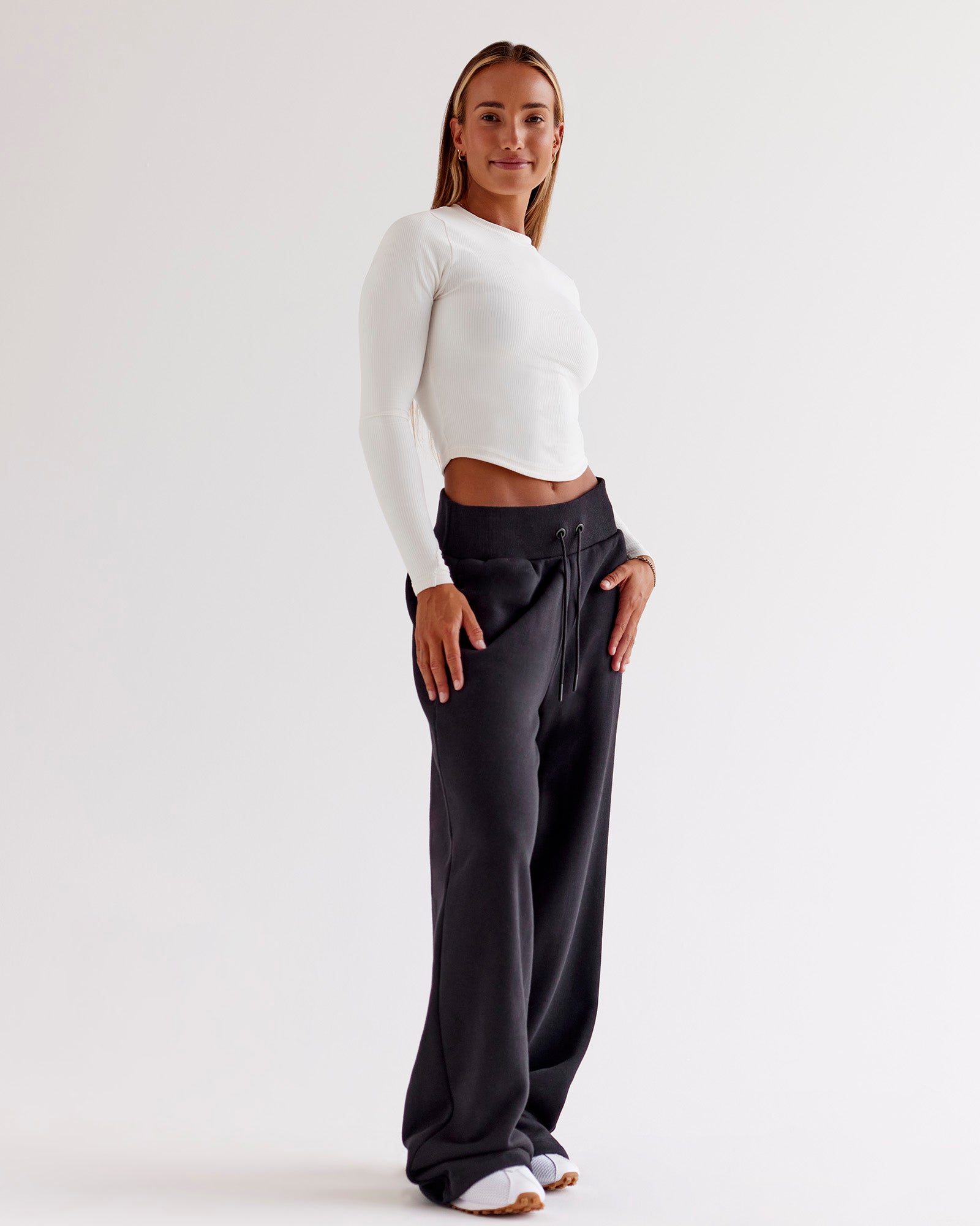 Woman wearing Go-To Wide Leg Track Pant - Black | Model:Jaimee | Size:XS