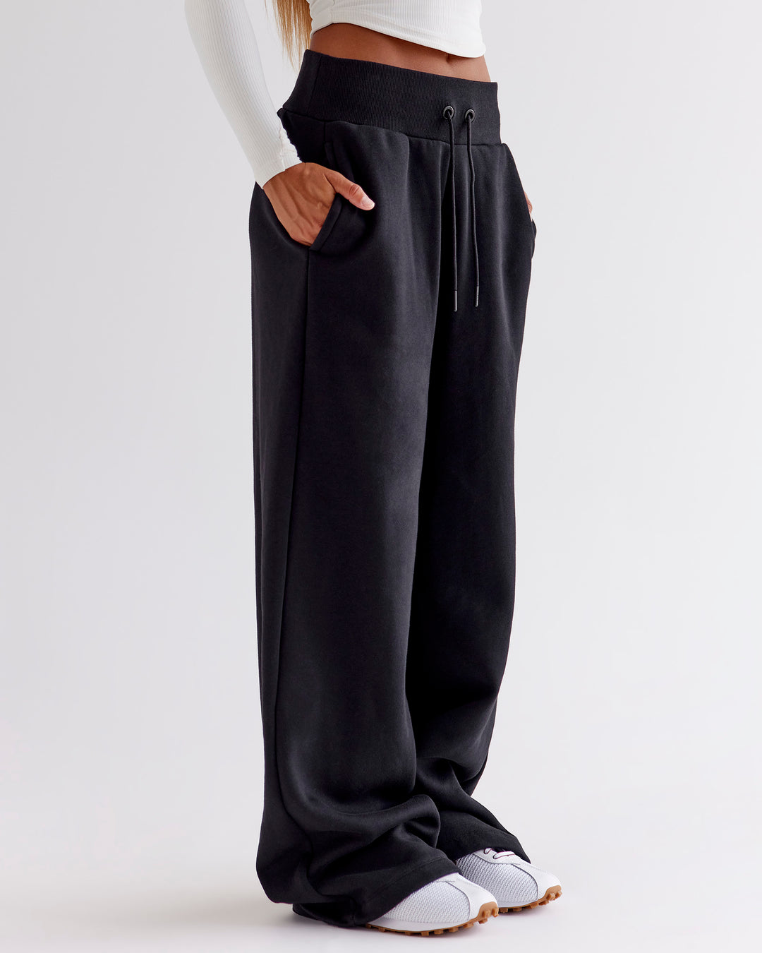 Woman wearing Go-To Wide Leg Track Pant - Black | Model:Jaimee | Size:XS
