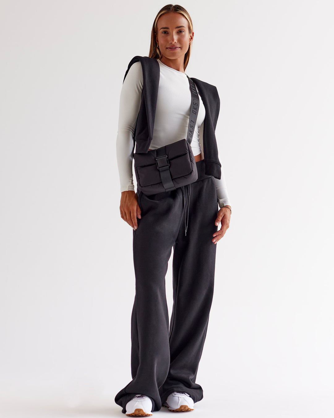 Woman wearing Go-To Wide Leg Track Pant - Black | Model:Jaimee | Size:XS