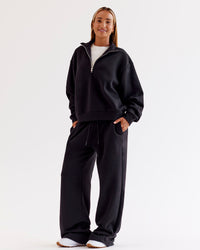 Woman wearing Go-To Wide Leg Track Pant - Black | Model:Jaimee | Size:XS