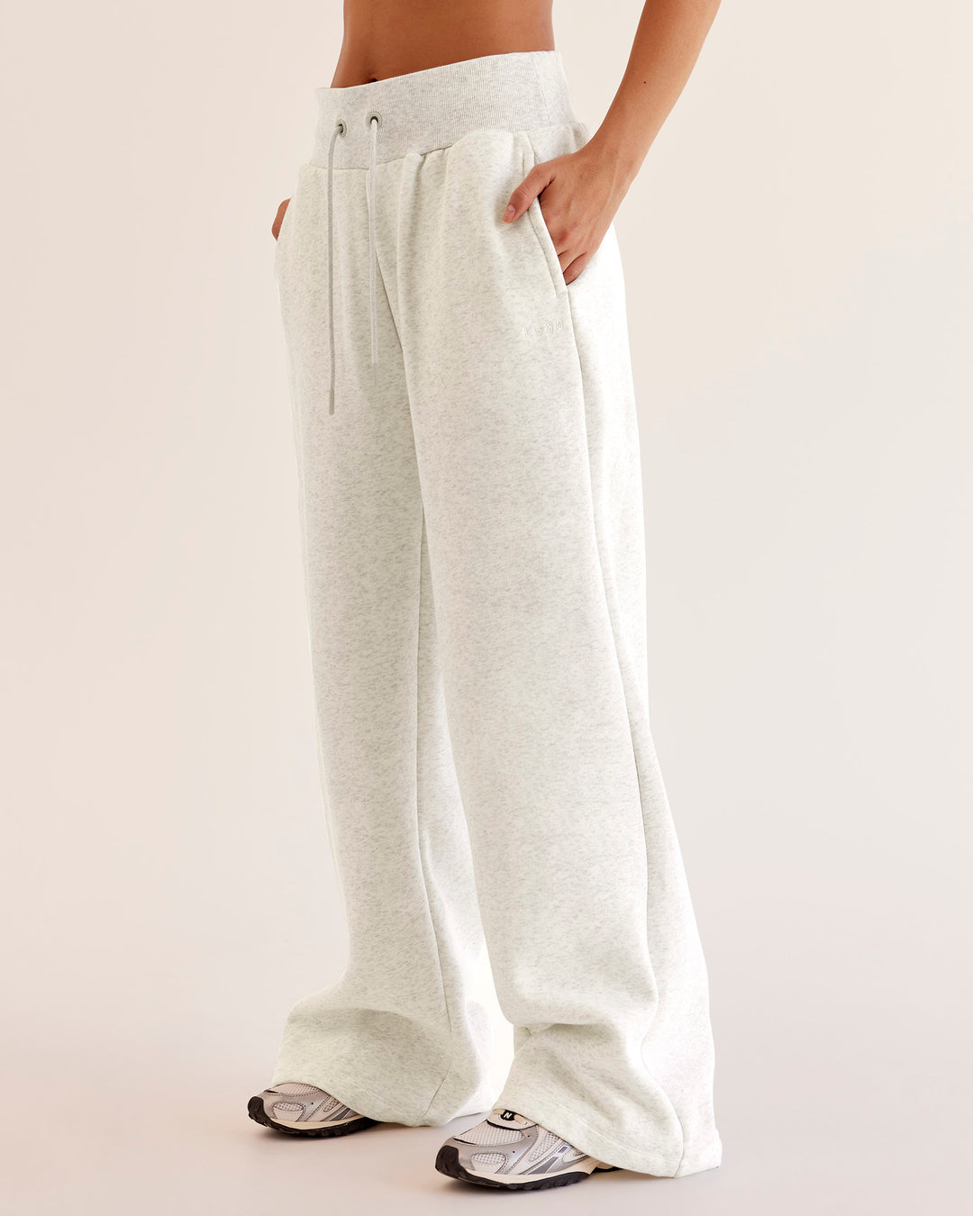 Woman wearing Go-To Wide Leg Track Pant - Silver Marl | Model:Eliza | Size:XS