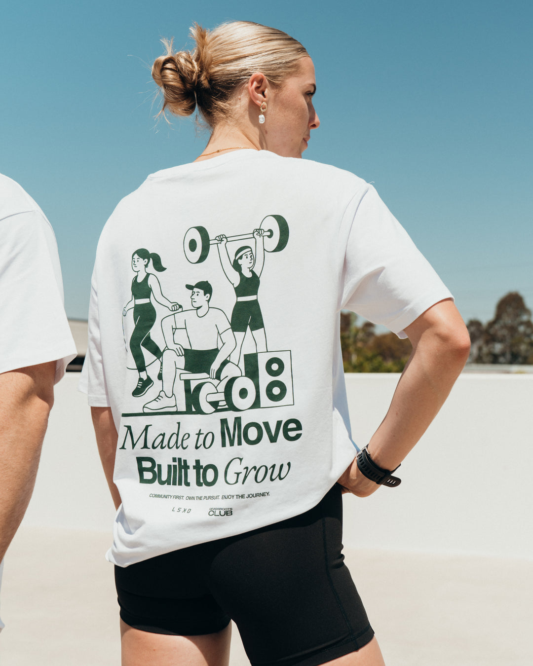 Woman wearing Grass Roots CFC FLXCotton Oversize Tee - White | Model:Shae | Size:XS