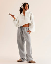Woman wearing Luxe ZeroCrease Spacer Half Zip - Silver Marl | Model:Loren | Size:XS