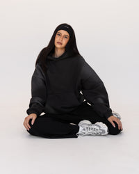 Woman wearing Memory In Motion 500gsm Ultra Heavyweight Washed Hoodie - Charcoal Washed | Model:Eliza | Size:XS