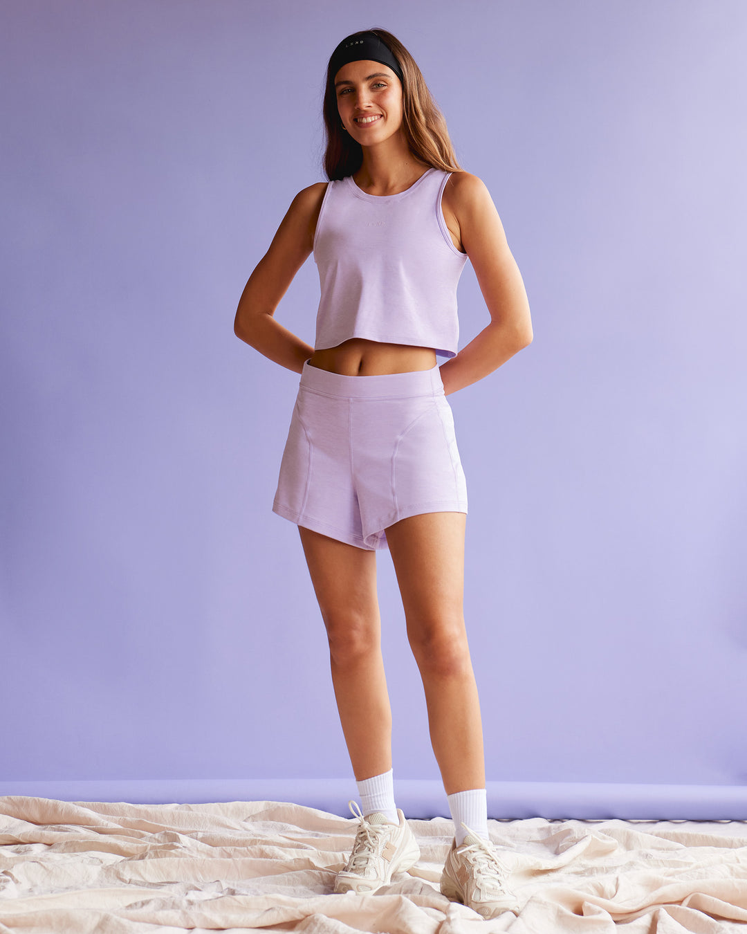 Woman wearing Movement CloudFLX 3&quot; Short - Orchid Bloom Marl | Model:Beatriz | Size:XS